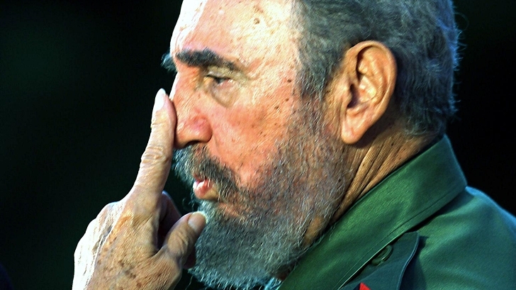 (FILES) This file photo taken on December 07, 2005 shows Cuban President Fidel Castro gesturing as he delivers his speech during a political meeting in Cardenas city, province of Matanzas, some 80 miles east of Havana. Cuban revolutionary icon Fidel Castro died late on November 25, 2016 in Havana, his brother announced on national television. / AFP PHOTO / ADALBERTO ROQUE